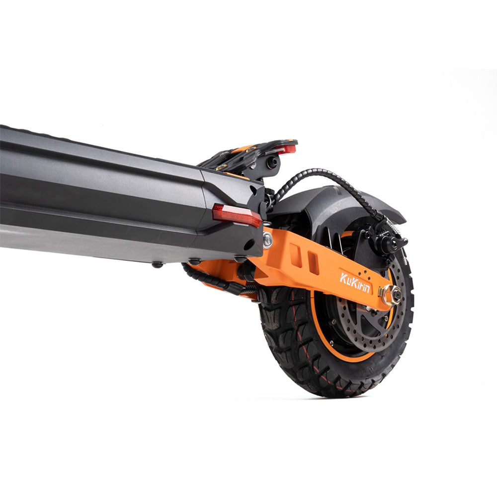KuKirin G2 Max electric scooter rear wheel with 9'' off-road tire, dual disc brake, and robust motor for rugged terrain performance.