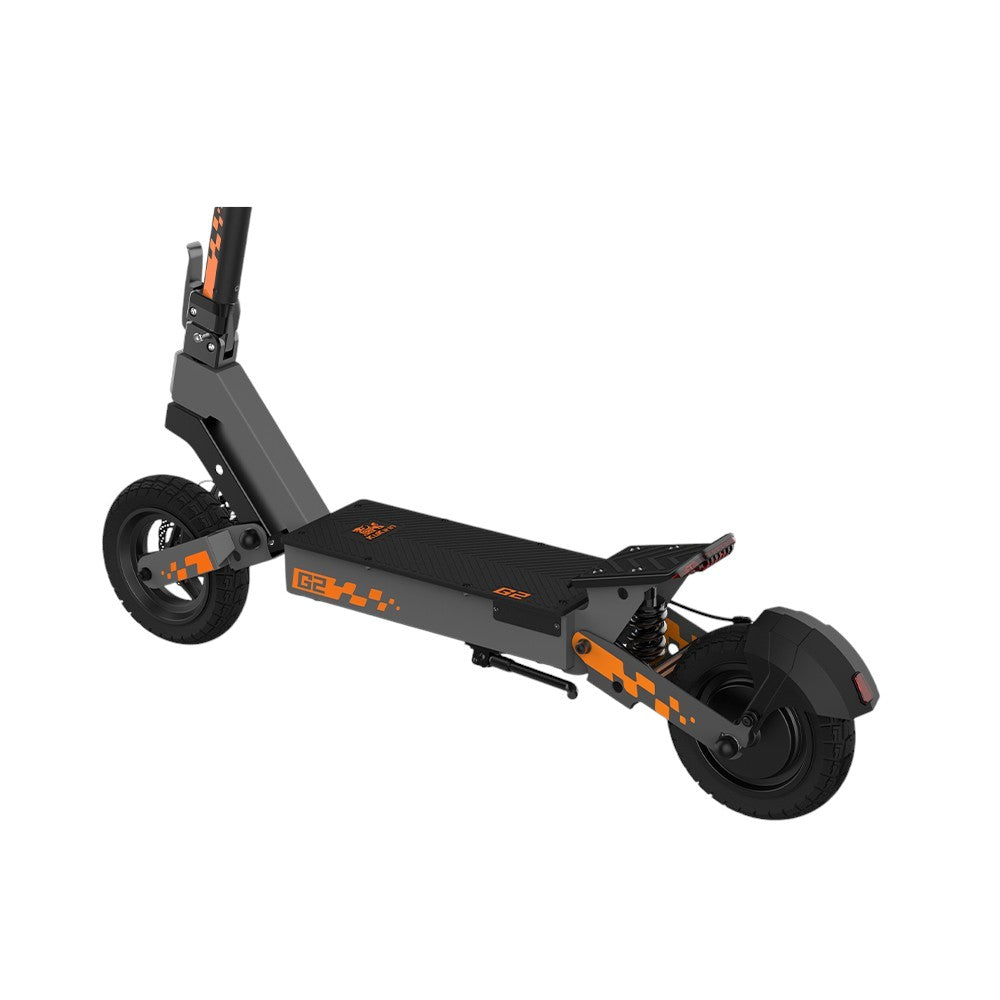 Kukirin G2 electric scooter with wide anti-slip deck for stable off-road riding. Features a robust black and orange design, suitable for adult riders seeking comfort and safety on rough terrain.